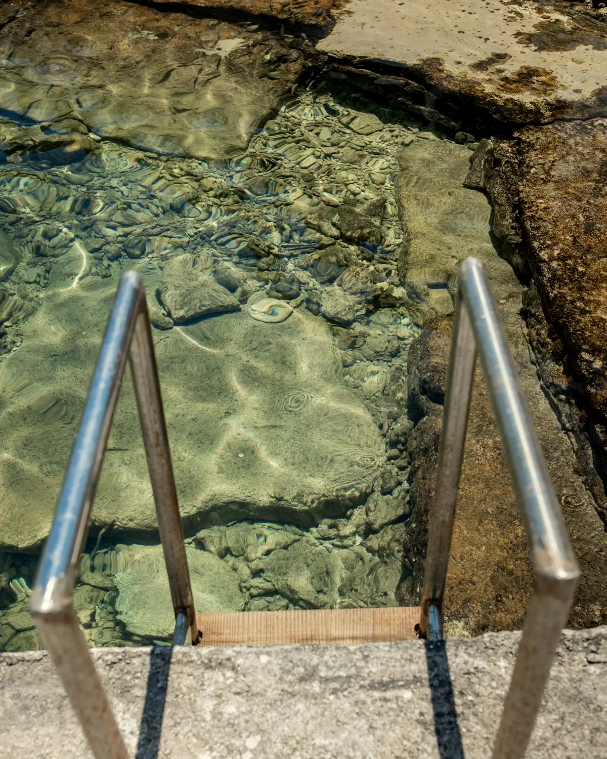 The natural-style pool set into the landscape.